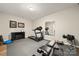 Home gym with treadmill, free weights, weight bench, and durable rubber flooring at 39617 Rosebay Ct, Fort Mill, SC 29707