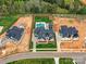 Stunning aerial view of the property featuring a pool, patio, and meticulously landscaped yard at 406 Sugar Maple Ln, Weddington, NC 28104