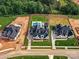 Aerial view of the property showcases the home, pool, and manicured landscaping and lawns at 406 Sugar Maple Ln, Weddington, NC 28104