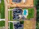 Aerial view of the house reveals the pool and outdoor living space in a well-manicured backyard at 406 Sugar Maple Ln, Weddington, NC 28104