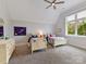 Bright and airy bedroom featuring two twin beds, dresser, large window, carpet and ceiling fan, perfect for or guests at 406 Sugar Maple Ln, Weddington, NC 28104