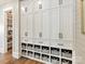 A walk-in pantry features white cabinets and drawers and a view to an adjacent room at 406 Sugar Maple Ln, Weddington, NC 28104