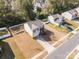 Aerial view of home featuring fenced-in yard, long driveway, and mature trees at 428 Wheat Field Dr, Mount Holly, NC 28120