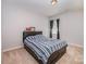 Comfortable bedroom with neutral carpet, a queen bed, and natural light from the window at 428 Wheat Field Dr, Mount Holly, NC 28120