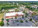 Overhead shot of a bustling shopping center with a large grocery store and a well-maintained parking lot at 4434 Patriots Hill Rd, Mint Hill, NC 28227
