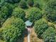 Aerial view of a gazebo with a green roof surrounded by large trees at 4434 Patriots Hill Rd, Mint Hill, NC 28227