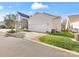 Exterior view of a home with a two-car garage and manicured lawn at 4434 Patriots Hill Rd, Mint Hill, NC 28227