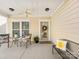 Cozy front porch with chairs, welcome mat and decor at 4434 Patriots Hill Rd, Mint Hill, NC 28227