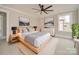 Primary bedroom featuring modern furnishing, windows and natural light at 4731 Whispering Oaks Dr, Charlotte, NC 28213