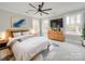Bedroom with white walls, natural light, and a ceiling fan at 4731 Whispering Oaks Dr, Charlotte, NC 28213