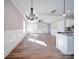 Open-concept living area featuring hardwood floors and modern finishes, ideal for entertaining guests at 4731 Whispering Oaks Dr, Charlotte, NC 28213
