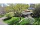 Aerial view of a home with mature landscaping and a large shade tree at 501 Eastwood Dr, Gastonia, NC 28054