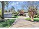 Charming home with a long driveway, a storage shed and mature trees at 501 Eastwood Dr, Gastonia, NC 28054
