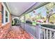 Covered porch with mosaic tile flooring and a view of the front yard at 501 Eastwood Dr, Gastonia, NC 28054
