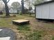 Backyard features a storage shed next to an outdoor recreational area at 609 Mccarten St, Monroe, NC 28112