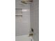 Shower with gray subway tile and gold accents at 609 Mccarten St, Monroe, NC 28112
