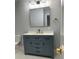 Elegant bathroom with custom vanity, luxurious mirror, and updated fixtures at 609 Mccarten St, Monroe, NC 28112