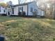 Charming home with well-maintained lawn, manicured shrubs and inviting curb appeal at 609 Mccarten St, Monroe, NC 28112