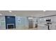 Open-concept living space featuring a fireplace, new appliances, and lots of natural light at 609 Mccarten St, Monroe, NC 28112