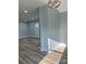 Bright living room featuring updated lighting, neutral wall colors, and hardwood floors at 609 Mccarten St, Monroe, NC 28112