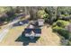 An aerial view shows a home on a large lot with several outbuildings at 6441 Highway 73 W Hwy, Mount Gilead, NC 27306