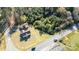 Overhead view showcasing the home nestled among trees along a scenic road at 6441 Highway 73 W Hwy, Mount Gilead, NC 27306