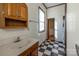 Cozy bathroom with checkered flooring, vintage vanity and ample natural light at 6441 Highway 73 W Hwy, Mount Gilead, NC 27306