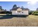 A charming single-story home features a classic design and a well-maintained yard at 6441 Highway 73 W Hwy, Mount Gilead, NC 27306