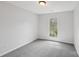Neutral bedroom with fresh paint and a window with natural light at 6501 Thamesmead Ln, Mint Hill, NC 28227