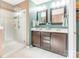 Bathroom with walk-in shower, dual sink vanity with modern fixtures, and tile floors at 7426 Calhoun Falls Dr, Rock Hill, SC 29732