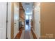 Entryway showcasing gleaming hardwood floors and open access to the main living area and stairs at 7426 Calhoun Falls Dr, Rock Hill, SC 29732