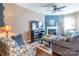 Cozy living room with hardwood floors, a fireplace, and comfortable seating perfect for relaxation at 7426 Calhoun Falls Dr, Rock Hill, SC 29732