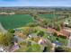 An aerial view of homes surrounded by picturesque fields and a serene countryside landscape at 841 E Zion Church Rd, Shelby, NC 28150
