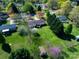 Aerial view of houses with beautiful, well-maintained yards and lush landscaping at 841 E Zion Church Rd, Shelby, NC 28150