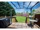 Inviting deck area with BBQ, seating, and a view of the spacious, green backyard at 841 E Zion Church Rd, Shelby, NC 28150