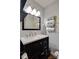 Bathroom with vanity, modern lighting, and decorative towels at 841 E Zion Church Rd, Shelby, NC 28150