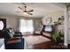 Well-lit living room with hardwood floors, comfortable seating, and tasteful decor for relaxation at 841 E Zion Church Rd, Shelby, NC 28150