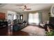 Cozy living room with hardwood floors, ceiling fan, and large window with lots of natural light at 841 E Zion Church Rd, Shelby, NC 28150