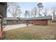 Expansive backyard showcasing a large concrete patio, perfect for gatherings and relaxation at 845 2Nd Nw St, Hickory, NC 28601