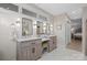 Bright bathroom featuring double vanity with marble counters, tub and lots of natural light at 845 2Nd Nw St, Hickory, NC 28601