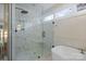 Modern bathroom with an expansive glass enclosed shower featuring a built-in shelf and soaking tub at 845 2Nd Nw St, Hickory, NC 28601