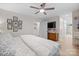Spacious bedroom with a comfortable bed, hardwood floors, and plenty of natural light at 845 2Nd Nw St, Hickory, NC 28601