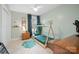 Charming bedroom with a modern bedframe, complemented by light green walls and natural light at 845 2Nd Nw St, Hickory, NC 28601