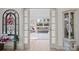 Hallway with views to play area, showcasing an elegant entry and a glimpse into a fun and functional space at 845 2Nd Nw St, Hickory, NC 28601