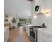 Modern kitchen seamlessly blending into the living area, featuring state-of-the-art appliances and stylish finishes at 845 2Nd Nw St, Hickory, NC 28601