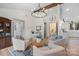 Bright living room features an open floor plan, modern chandelier, and adjacent bathroom and kitchen at 845 2Nd Nw St, Hickory, NC 28601