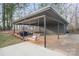 Backyard patio featuring an outdoor living space and swing at 845 2Nd Nw St, Hickory, NC 28601