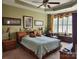 This well-decorated bedroom offers a comfortable setting with a large bed and nice windows at 86614 Arrington Rd, Lancaster, SC 29720