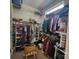 Walk-in closet features storage shelves, hanging space, and carpeting at 86614 Arrington Rd, Lancaster, SC 29720