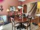 Cozy dining area with decorative mirror, traditional furnishings, and adjacent stairway at 86614 Arrington Rd, Lancaster, SC 29720